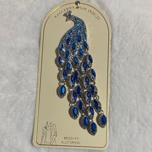 Eye candy Los Angeles blue jeweled peacock brooch pin